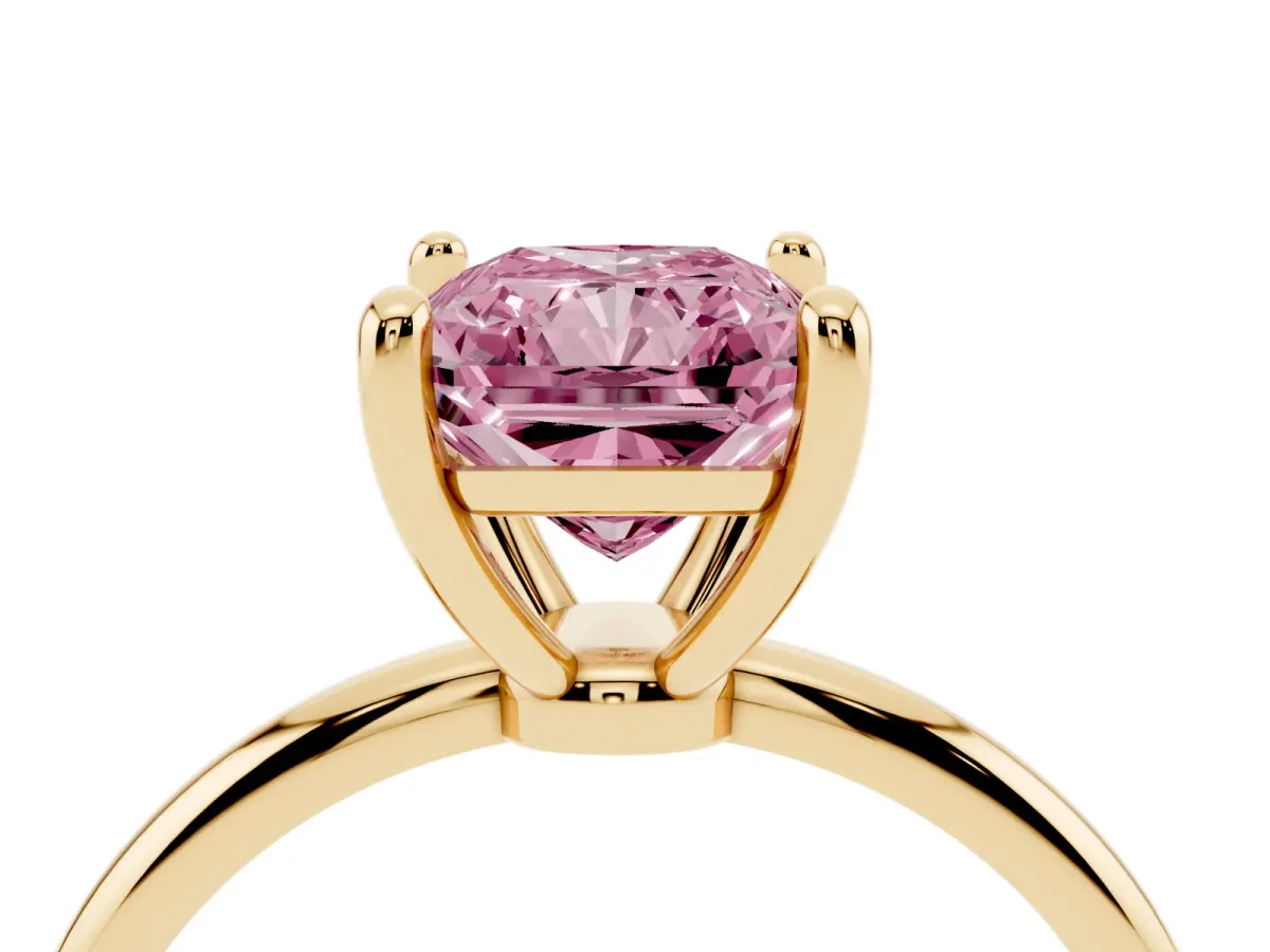 Fancy Pink Radiant Cut Solitaire Diamond Ring with 4-Prong Setting on a Classic Band Yellow gold