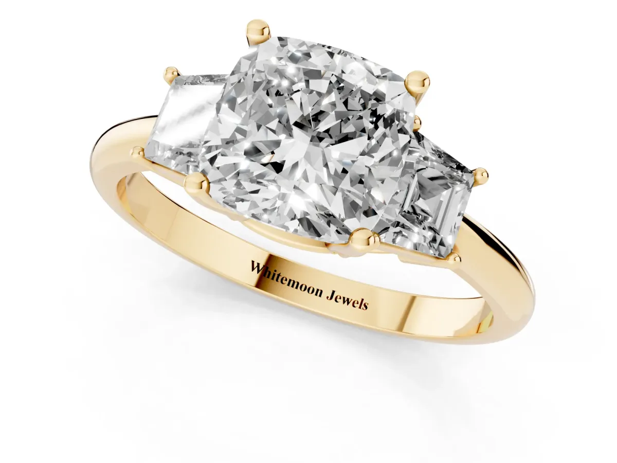 Cushion Cut Diamond Three-Stone Ring with Trapezoid Side Stones and Prong Setting Yellow gold