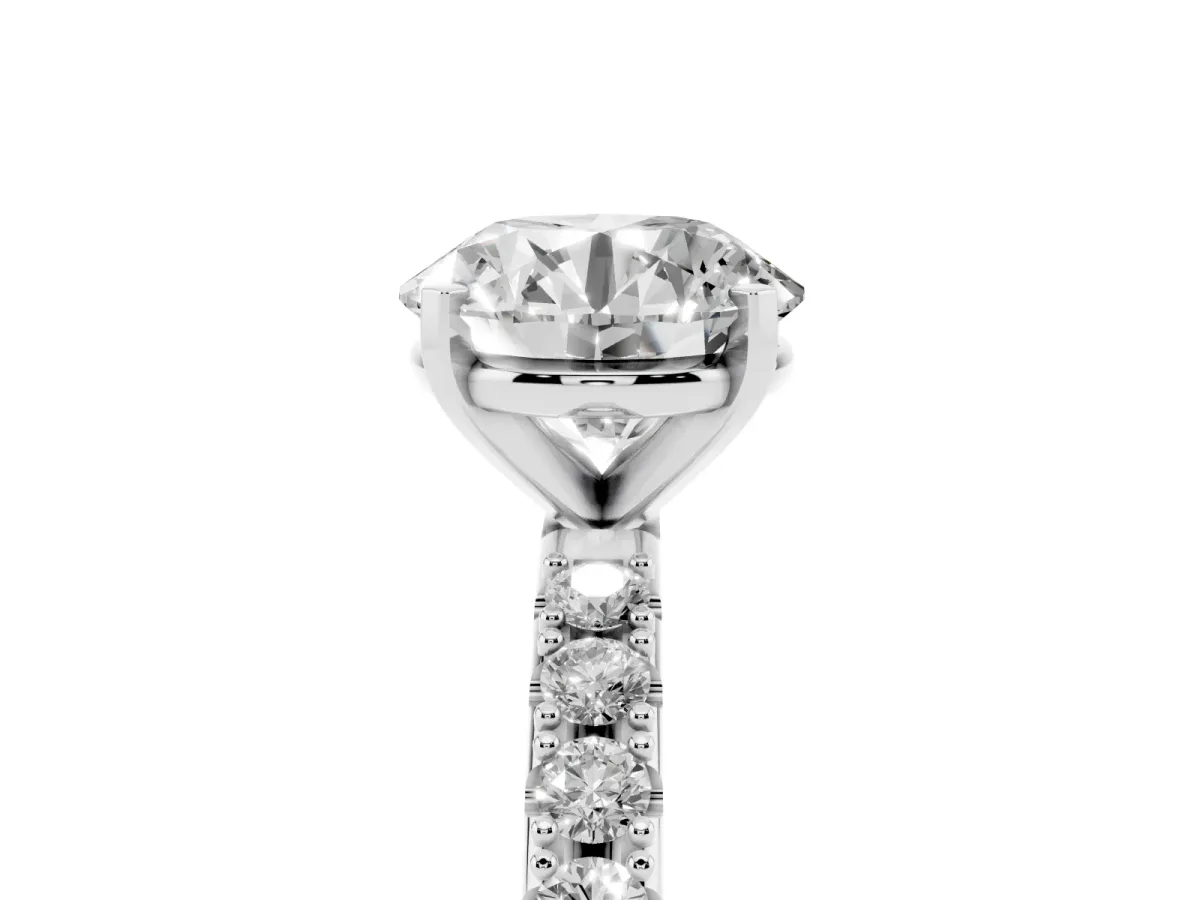 Round Cut Diamond Solitaire Pavé Band with Four-Prong Setting Silver