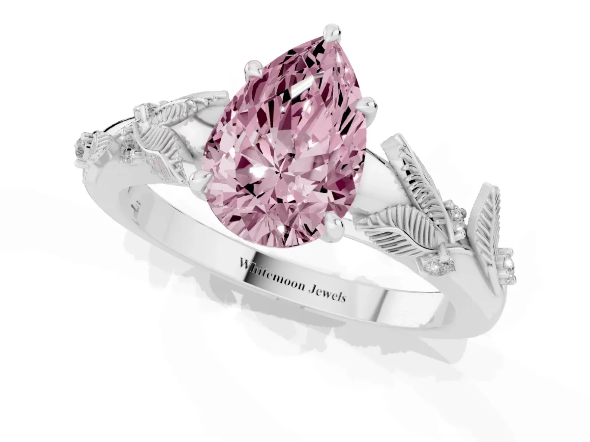 Fancy Pink Pear Cut Diamond Solitaire Ring with Leaf Motif Band and Four-Prong Setting Silver