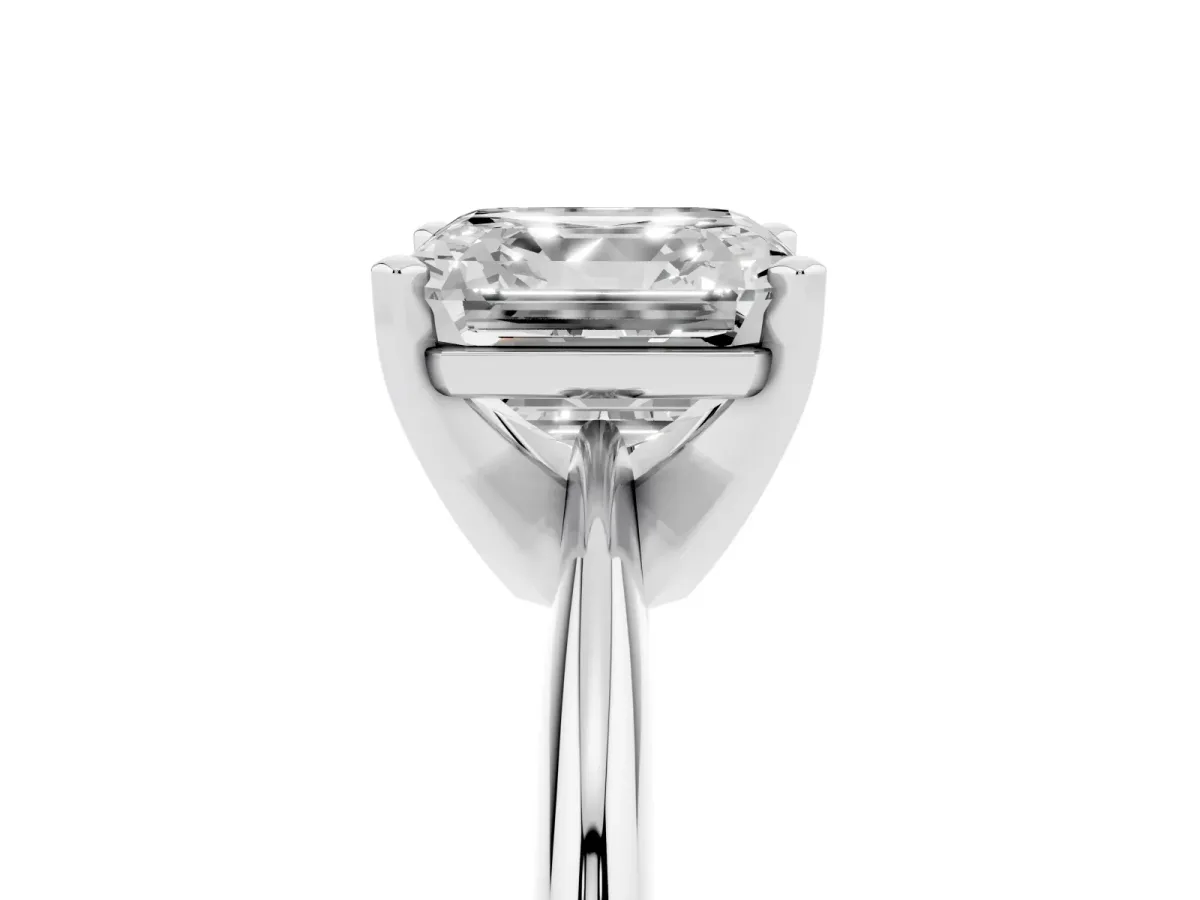 Asscher Cut Cut Solitaire Ring with Four-Prong Setting on a Classic Band Silver