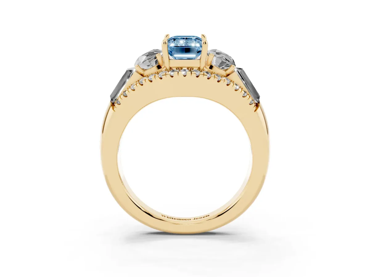 Fancy Blue Three-Stone Emerald Cut Diamond Engagement Ring with Pave Band and Prong Setting Yellow gold
