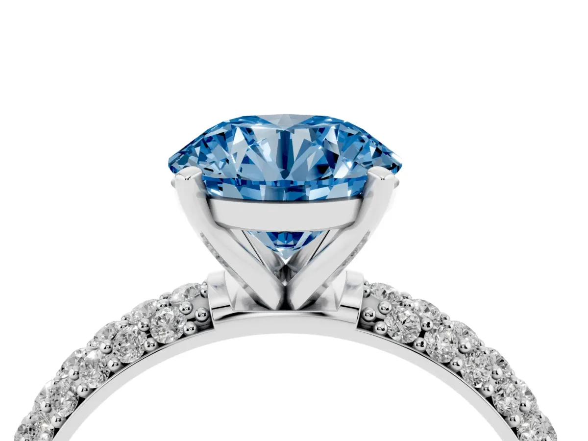 Fancy Blue Round Cut Diamond Solitaire Ring with Prong Setting and Pavé Band Platinum