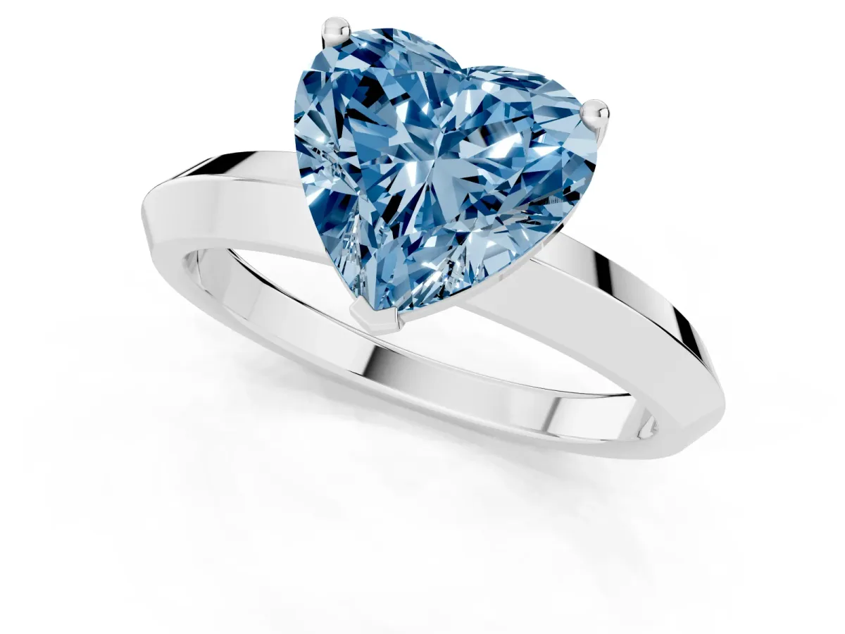 Fancy Blue Heart Cut Cut Solitaire Engagement Ring with Flat Band and Four-Prong Setting Silver
