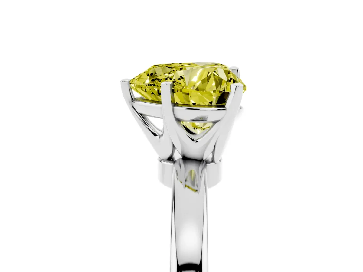Fancy Yellow Heart Cut Solitaire Diamond Ring with Six-Prong Setting on a Classic Band Silver