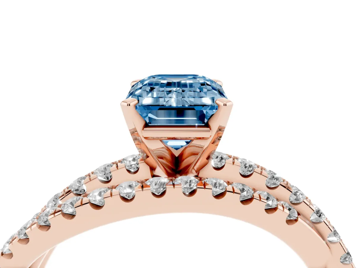 Fancy Blue Emerald Cut Solitaire Twist Band with Pavé Setting and Four-Prong Setting Rose gold
