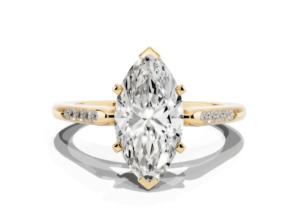 Marquise Cut Diamond Solitaire Ring with Channel Set Round Band and Prong Setting Yellow gold