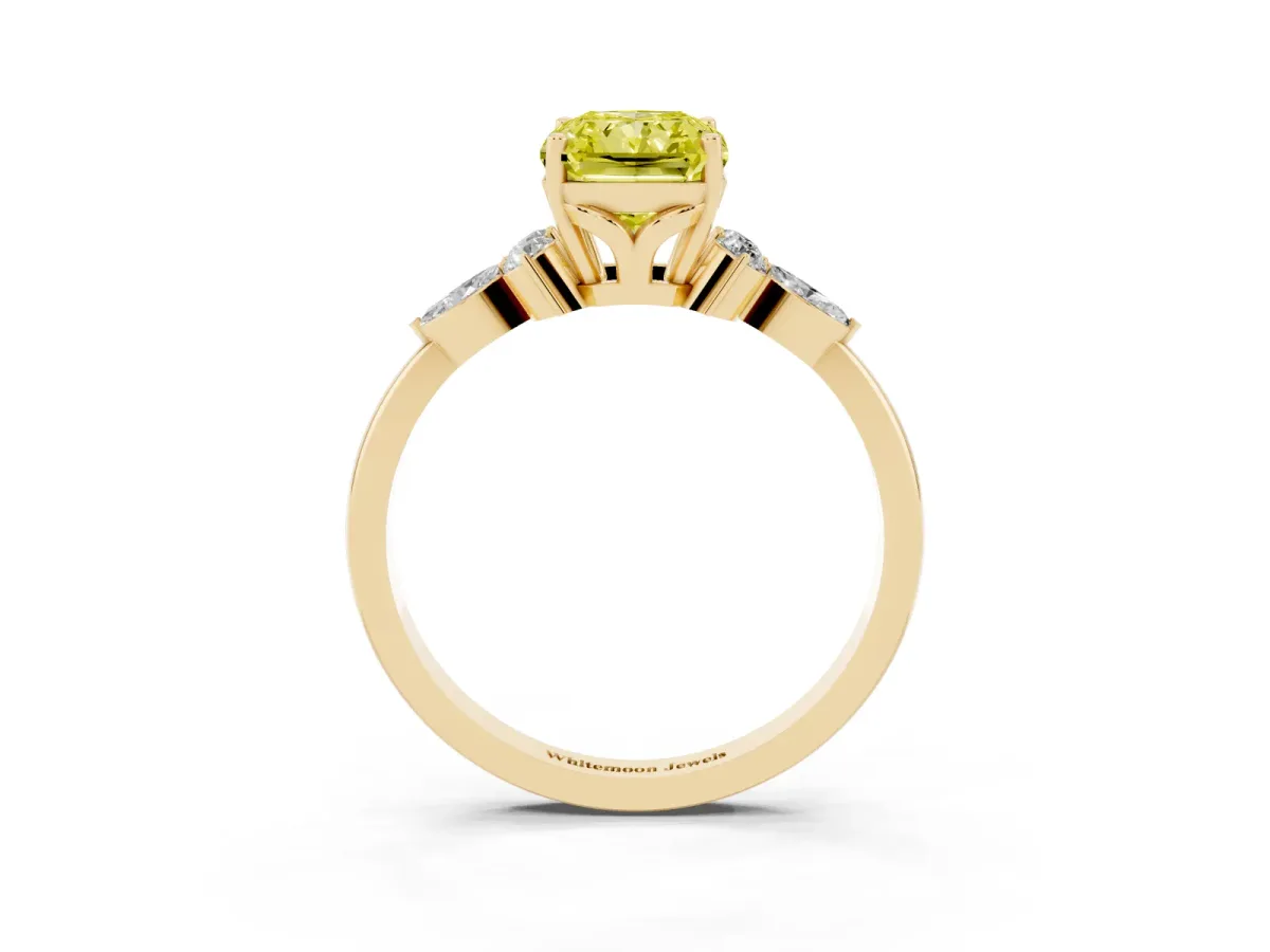 Fancy Yellow Radiant Cut Brilliant Diamond Solitaire Ring with Pear Side Stones and Four-Prong Setting Yellow gold