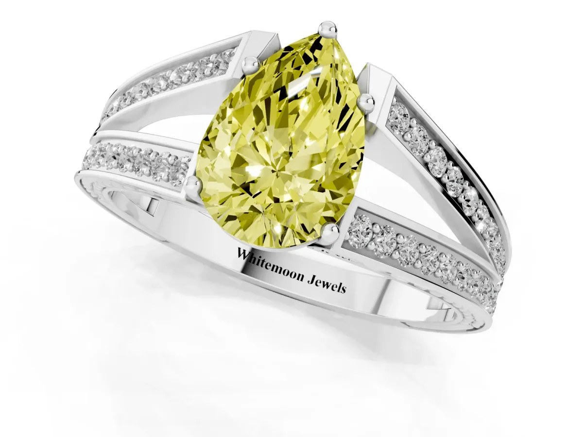 Fancy Yellow Pear Cut Diamond Split Shank Ring with Pavé Band and Four-Prong Setting Silver