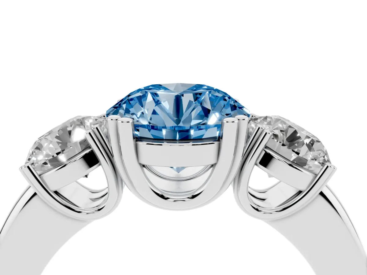 Fancy Blue Three-Stone Round Cut Cut Diamond Ring with Channel Set Band and Four-Prong Setting Silver