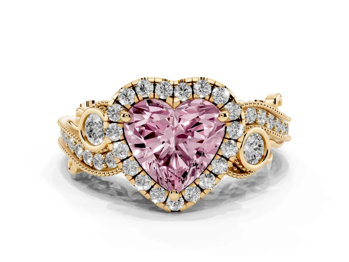 Fancy Pink Heart Cut Halo Diamond Ring with Milgrain and Bezel Accents on a Split Shank Band Yellow gold