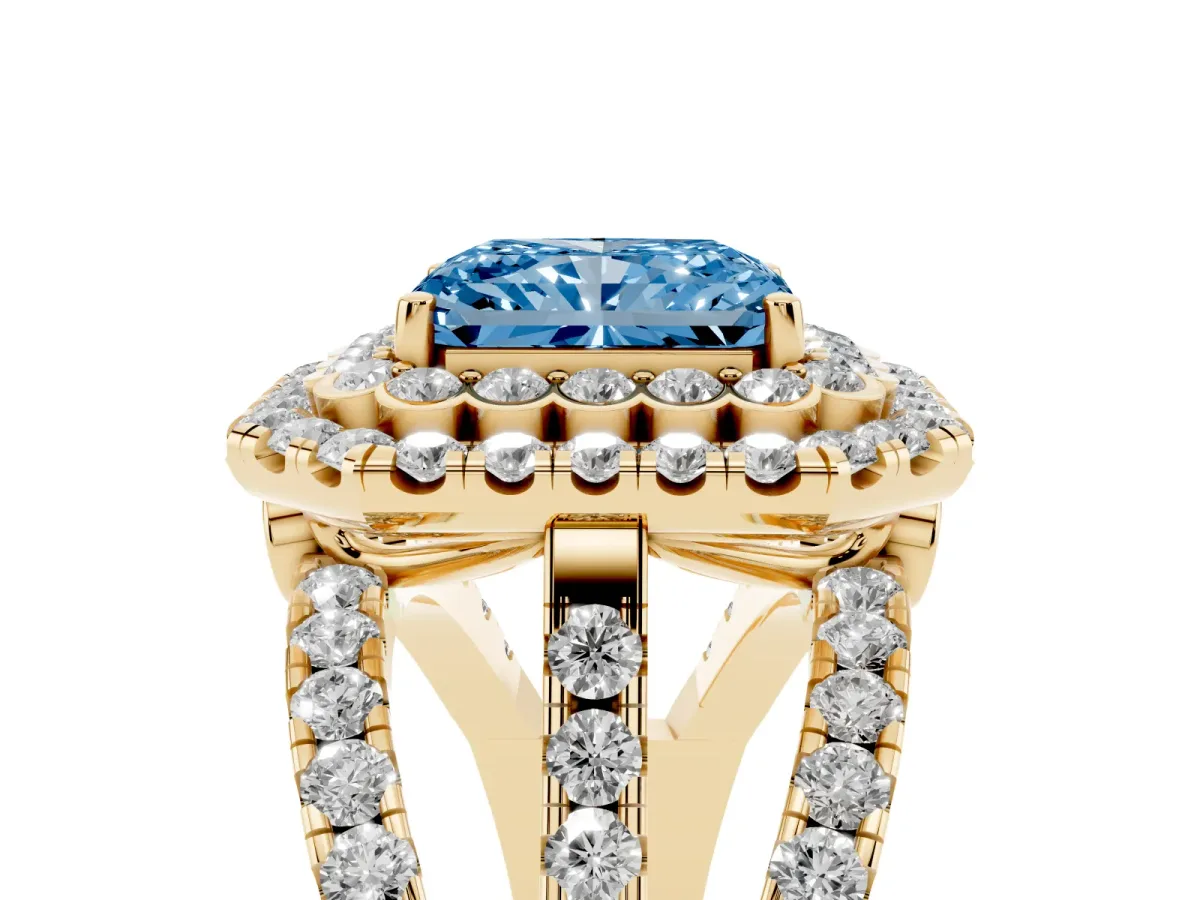 Fancy Blue Radiant Cut Diamond Double Halo Ring with Round Pavé Split Shank and Prong Setting Yellow gold