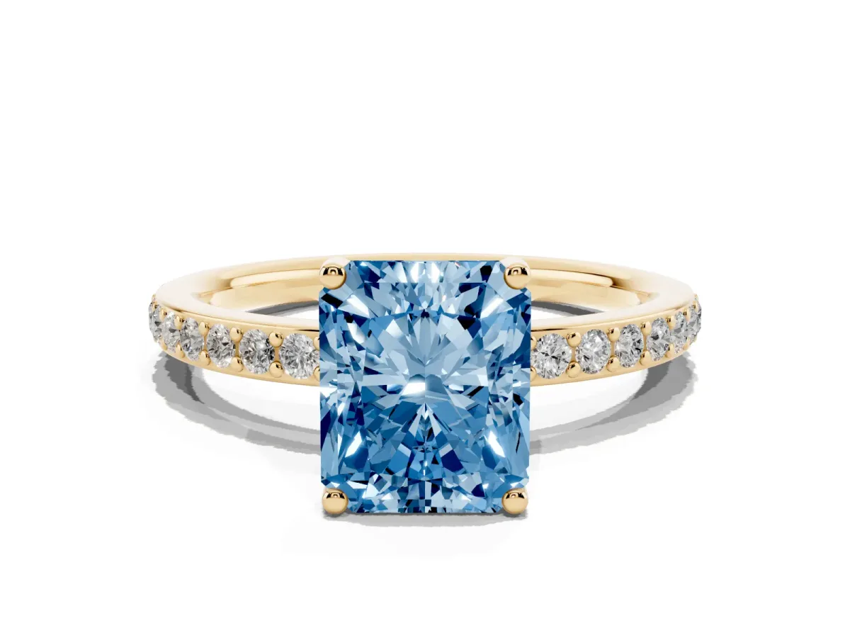 Fancy Blue Radiant Cut Cut Diamond Pavé Band Ring with Four-Prong Setting Yellow gold