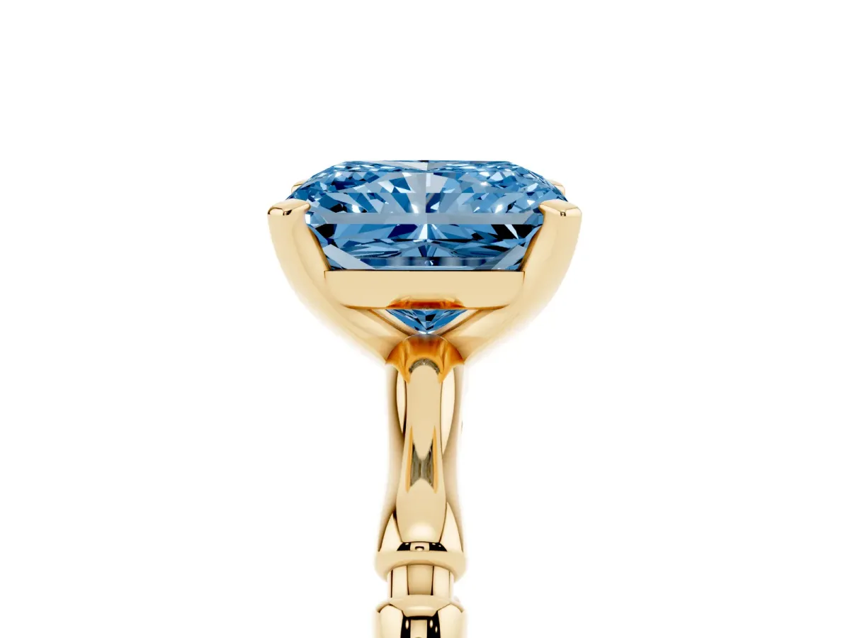 Fancy Blue Radiant Cut Solitaire Diamond Ring with Bamboo Band and Four-Prong Setting Yellow gold