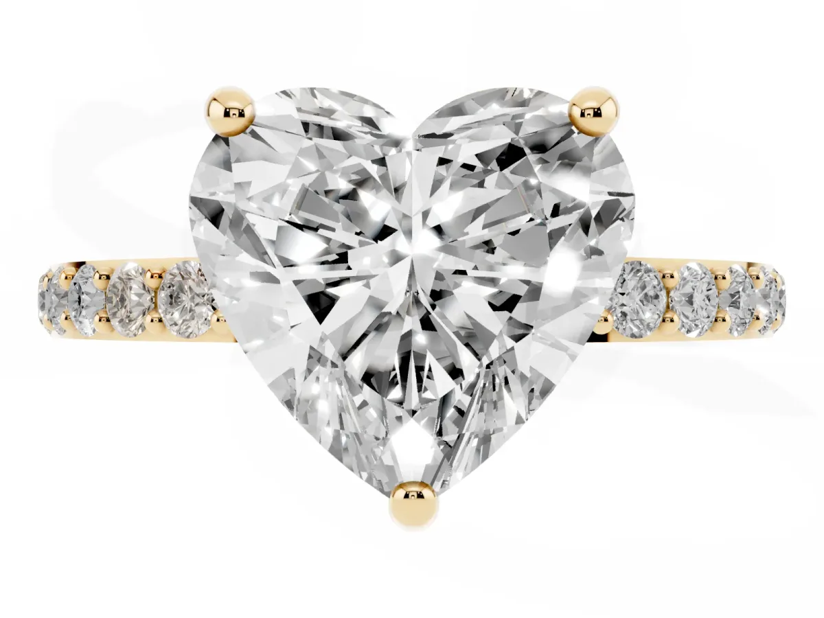 Heart Cut Diamond Solitaire Ring with Round Pavé Band and Prong Setting Yellow gold