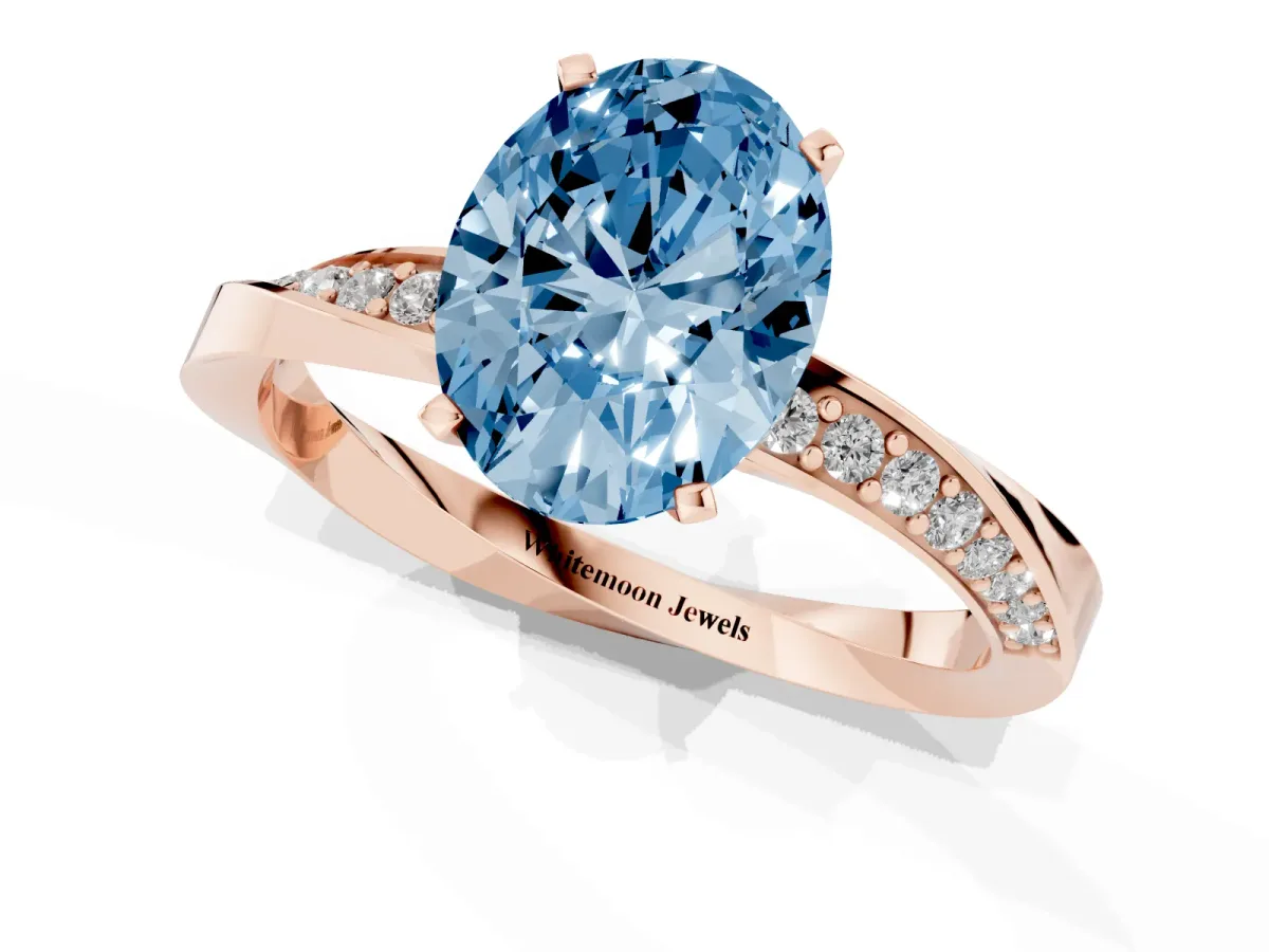 Fancy Blue Oval Cut Diamond Engagement Ring with Side Stone Accents and Four-Prong Setting Rose gold