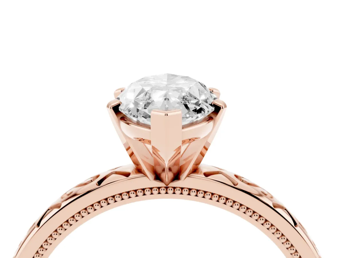 Marquise Cut Solitaire Engagement Ring with Scrollwork Band and Four-Prong Setting Rose gold