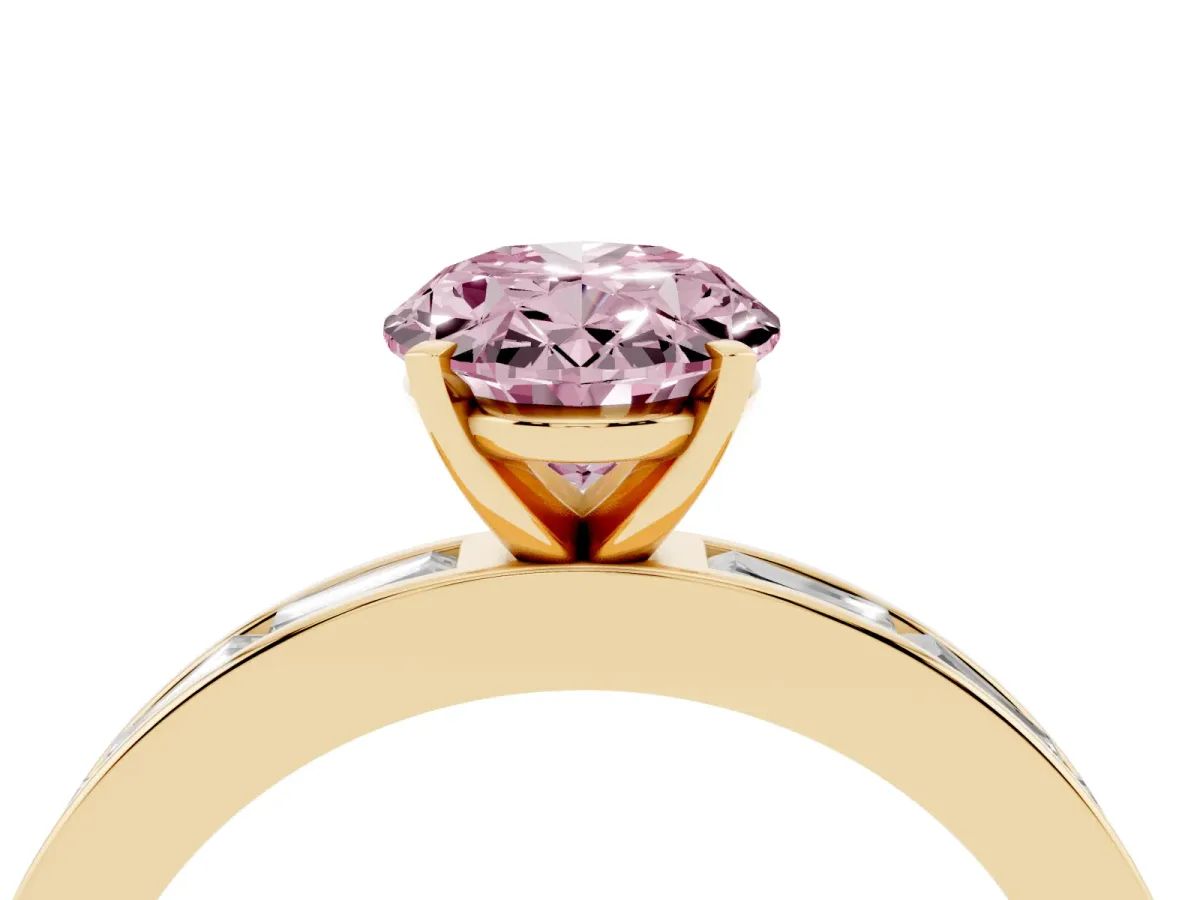 Fancy Pink Oval Cut Solitaire Diamond Ring with Channel-Set Baguette Band and Four-Prong Setting Yellow gold