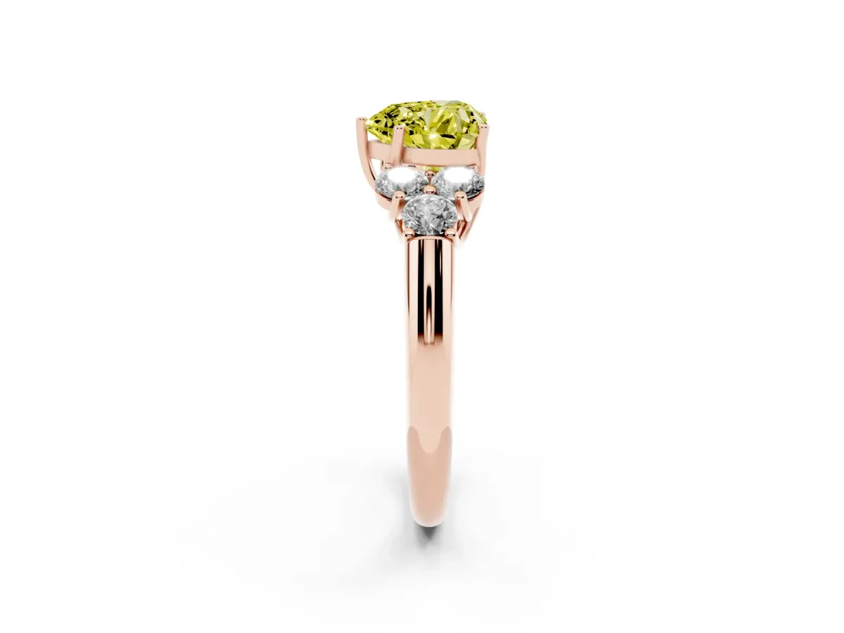 Fancy Yellow Heart Cut Cut Diamond Cluster Ring with Round Accent Stones and Prong Setting on a Classic Band Rose gold