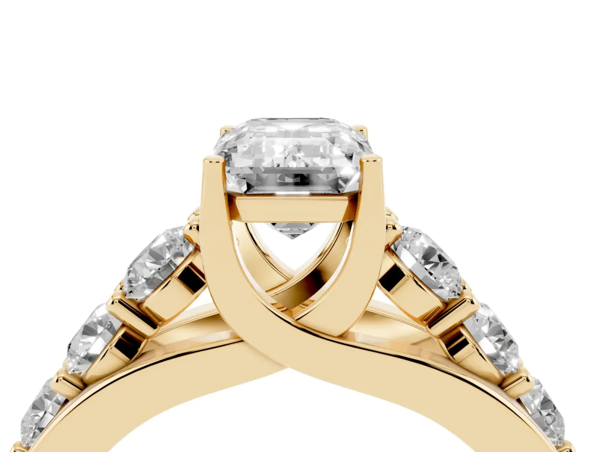 Emerald Cut Diamond Engagement Ring with Pavé Band and Four-Prong Setting Yellow gold