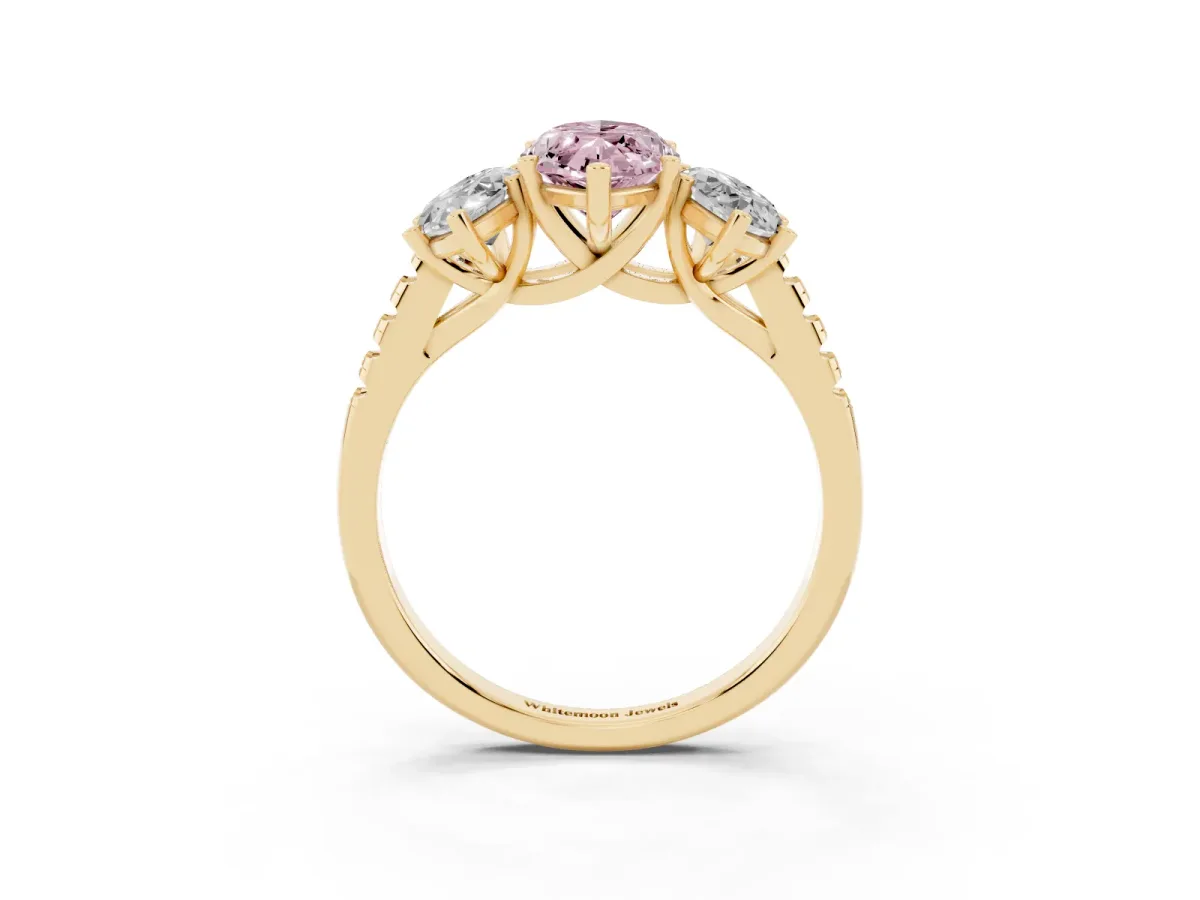 Fancy Pink Three-Stone Marquise Cut Diamond Ring with Round Pavé Band and Prong Setting Yellow gold
