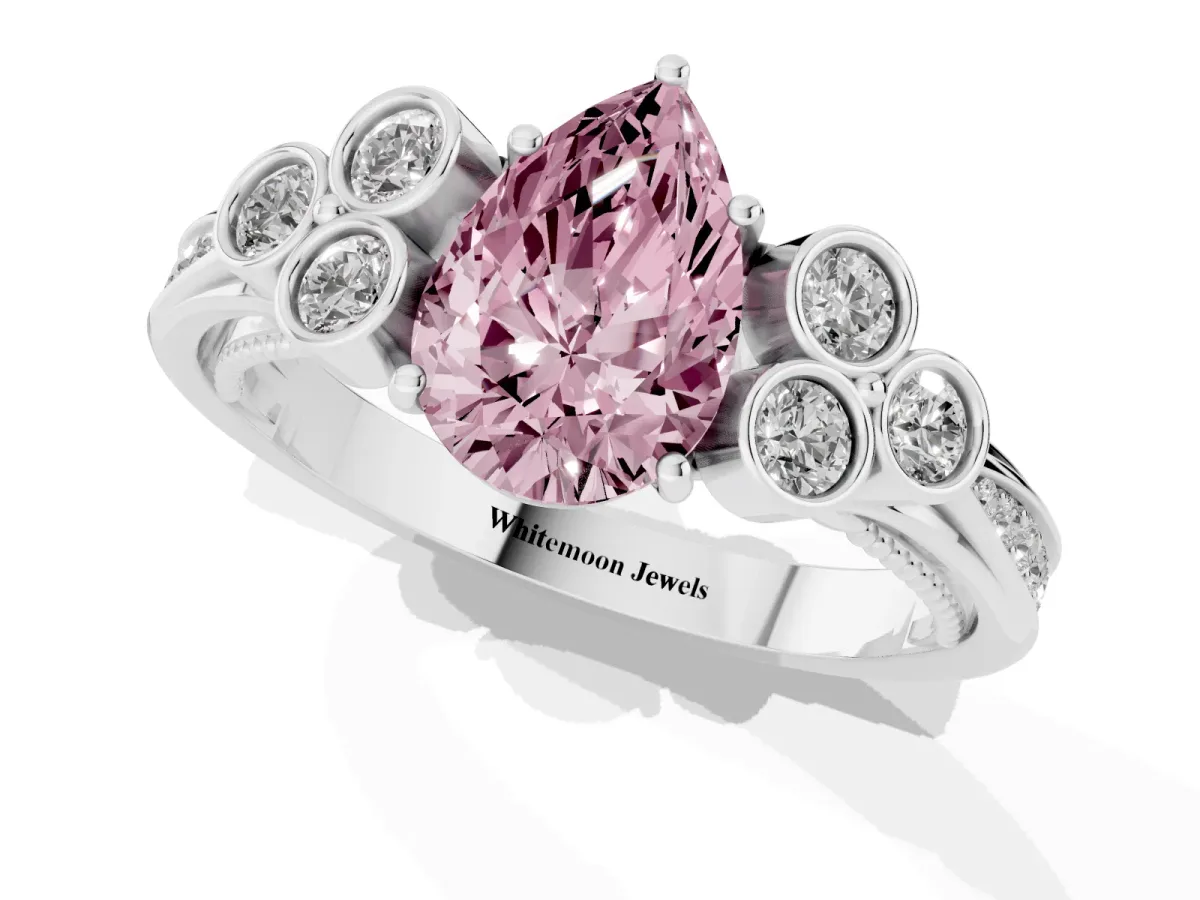Fancy Pink Pear Cut Cut Diamond Engagement Ring with Bezel Set Round Side Stones and Prong Setting Silver