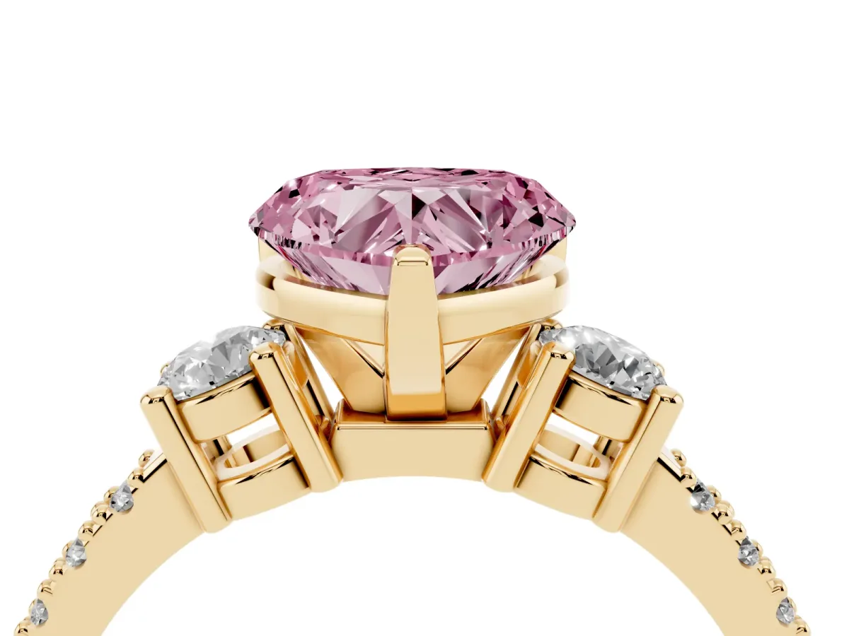Fancy Pink Heart Cut Three-Stone Diamond Pavé Band with Prong Setting Yellow gold