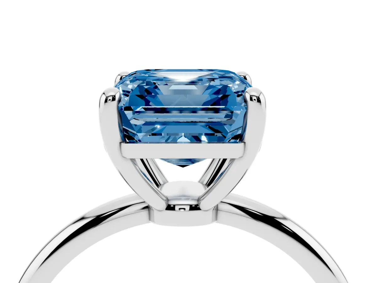 Fancy Blue Asscher Cut Solitaire Diamond Ring with 4-Prong Setting on a Classic Band Silver