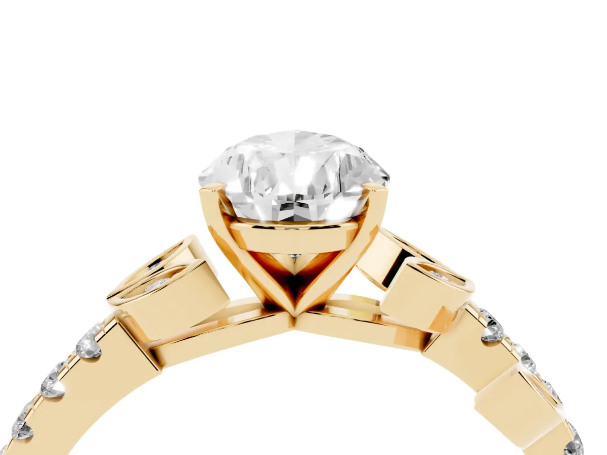 Pear Cut Solitaire Leaf-Inspired Diamond Ring with Pavé Band and Four-Prong Setting Yellow gold