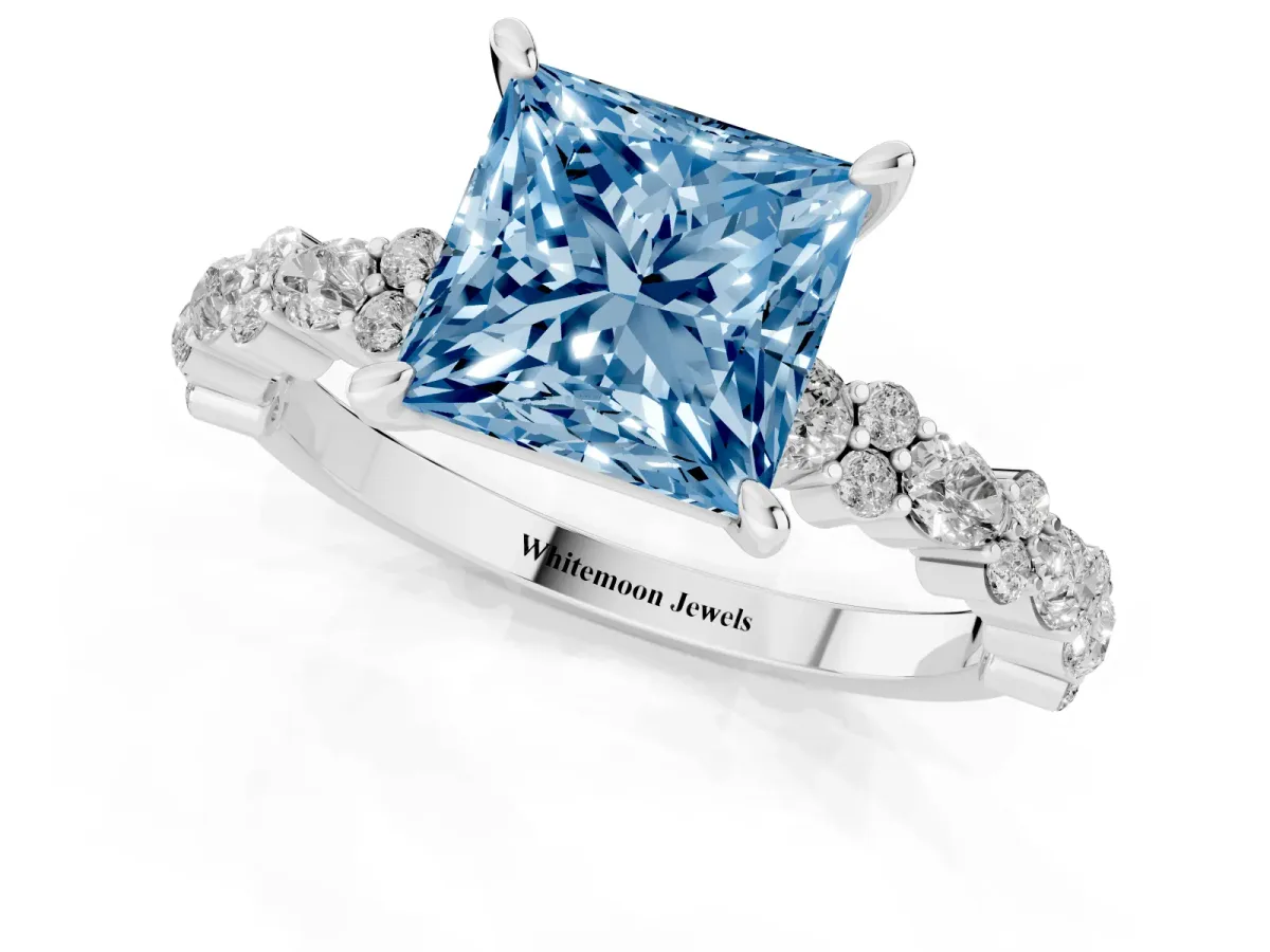 Fancy Blue Princess Cut Diamond Side Stone Solitaire Ring with Round and Four-Prong Setting Silver