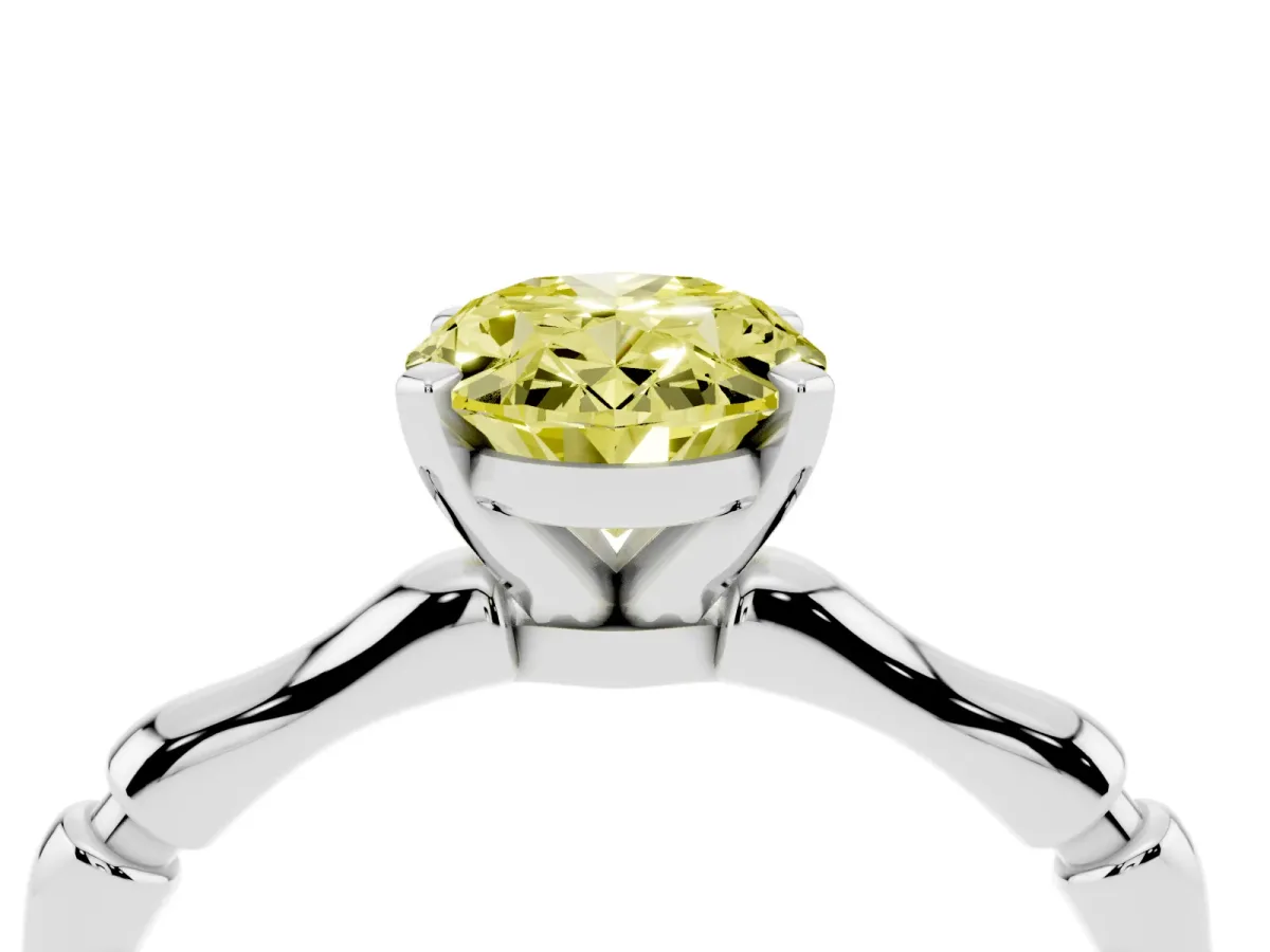 Fancy Yellow Oval Cut Solitaire Diamond Ring with Bamboo Band and Four-Prong Setting Silver