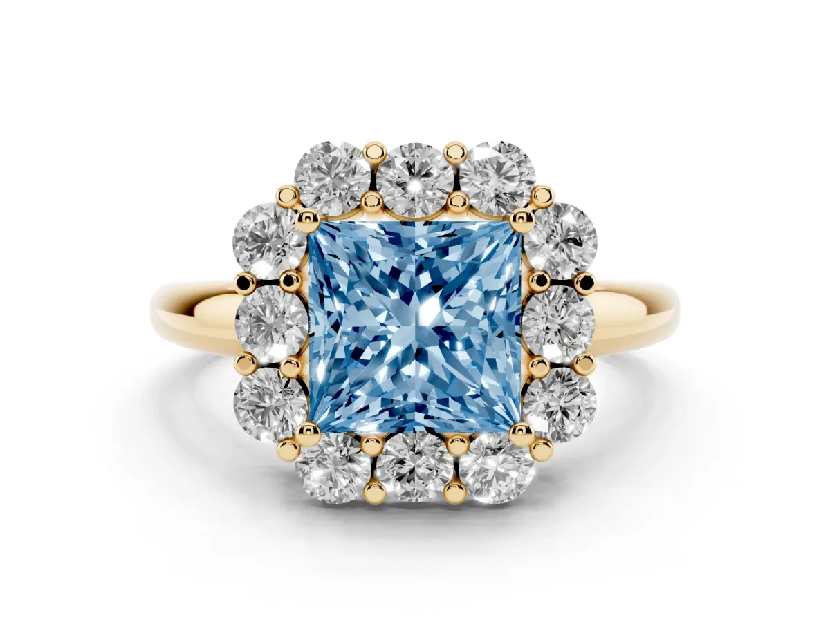 Fancy Blue Princess Cut Halo Milgrain Solitaire with Bezel Set Side Stones and Pave Band Yellow gold