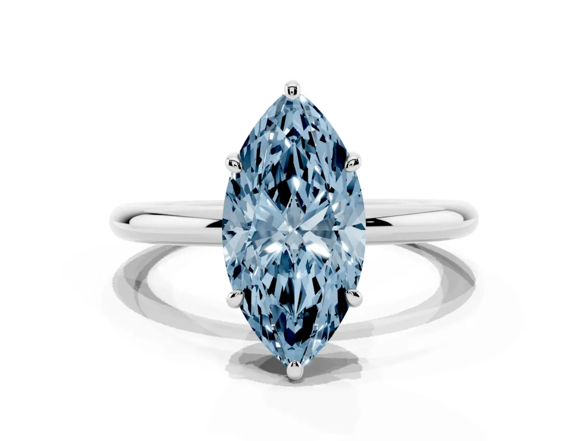Fancy Blue Marquise Cut Solitaire Diamond Ring with Four-Prong Setting on a Plain Band Silver