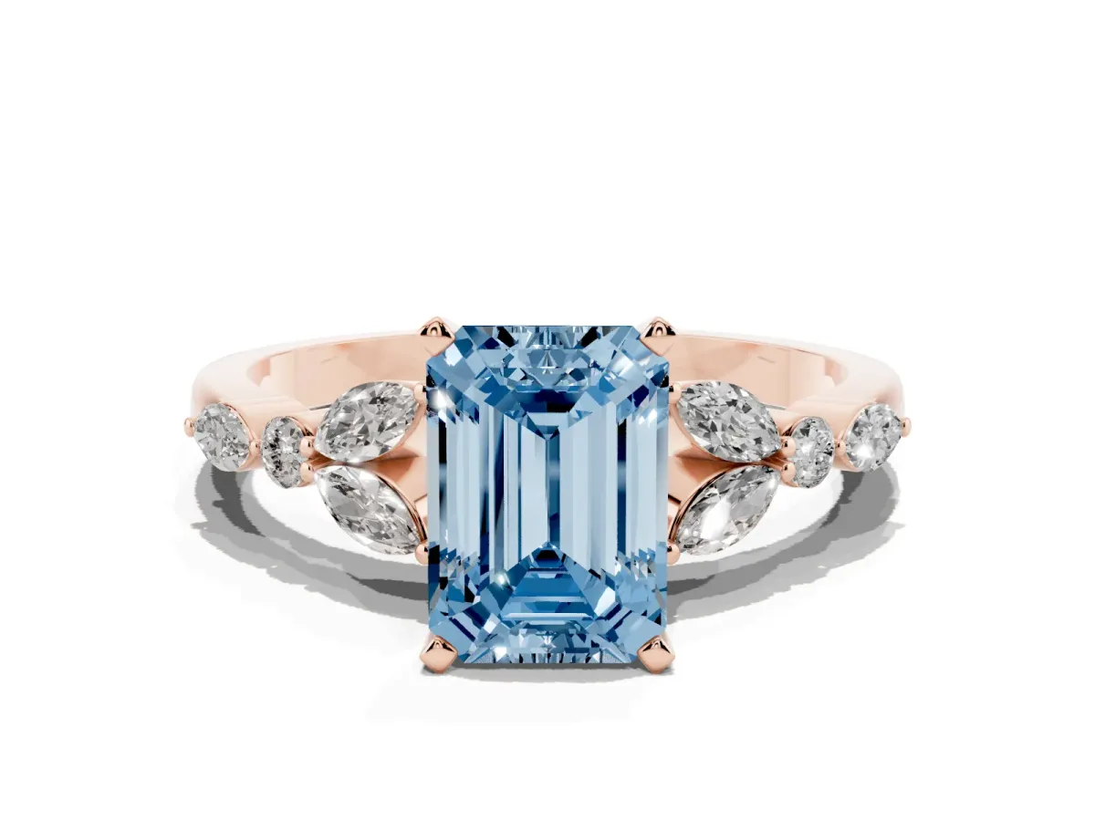 Fancy Blue Emerald Cut Diamond Solitaire Ring with Side Stones and Four-Prong Setting Rose gold