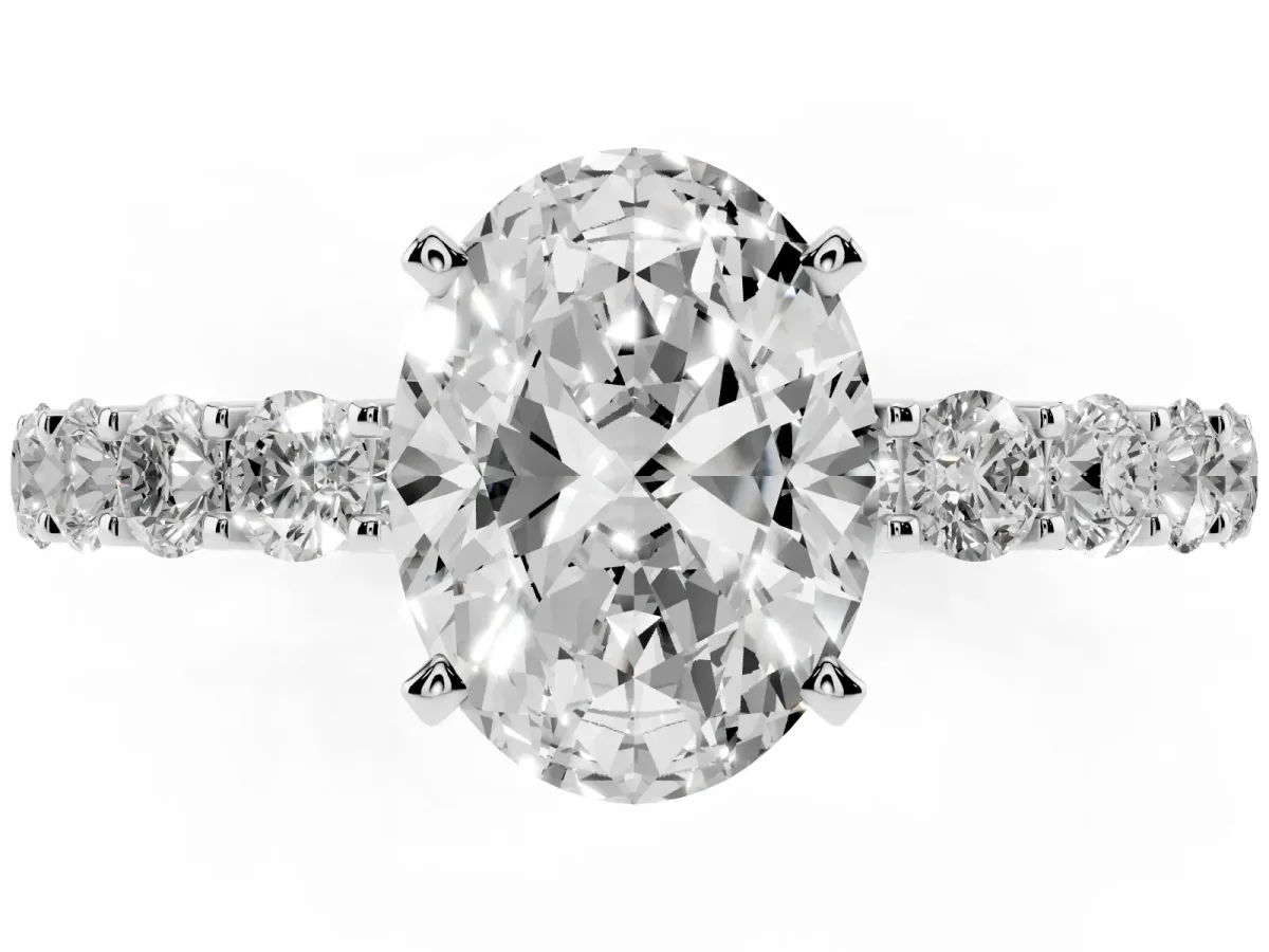 Oval Cut Diamond Solitaire Ring with Shared Prong Pavé Band and Four-Prong Setting Silver