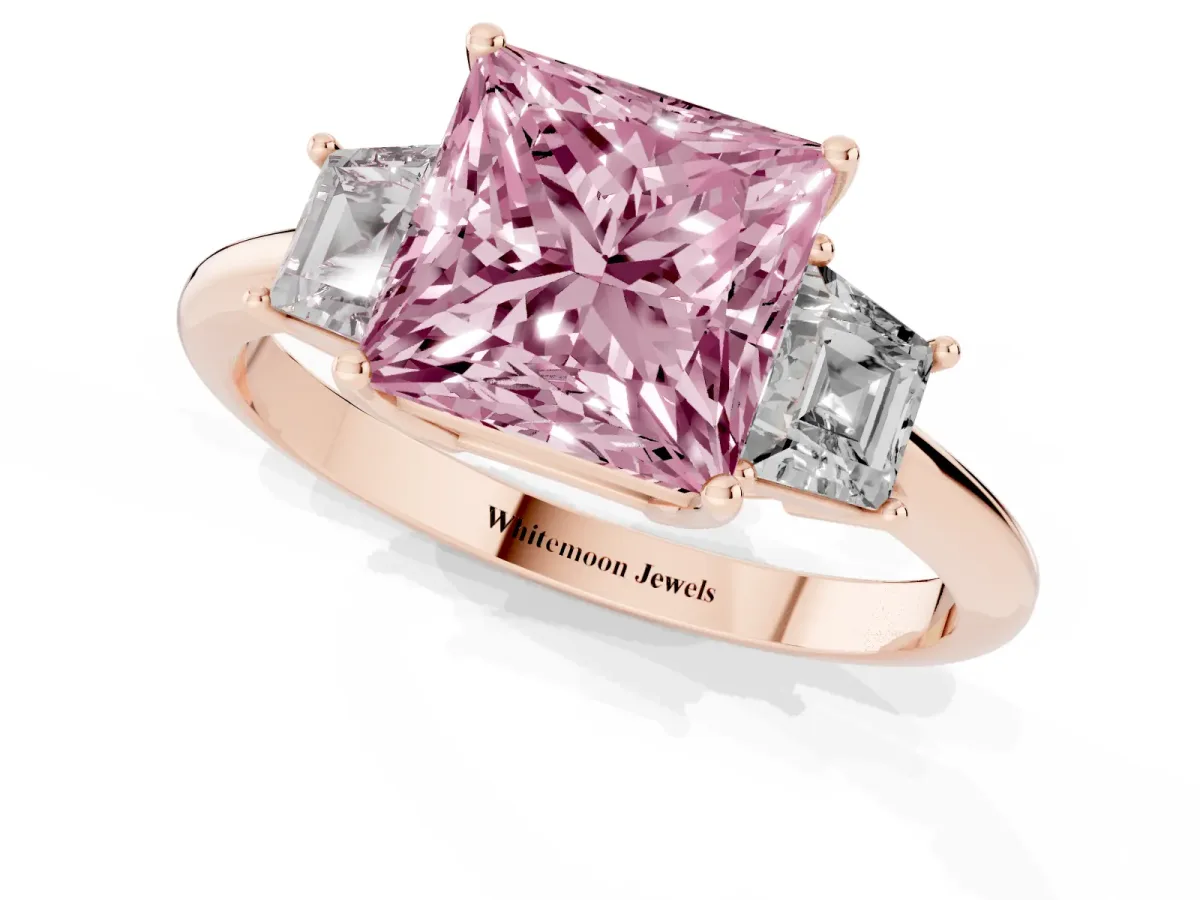 Fancy Pink Princess Cut Diamond Three-Stone Ring with Trapezoid Side Stones and Prong Setting Rose gold