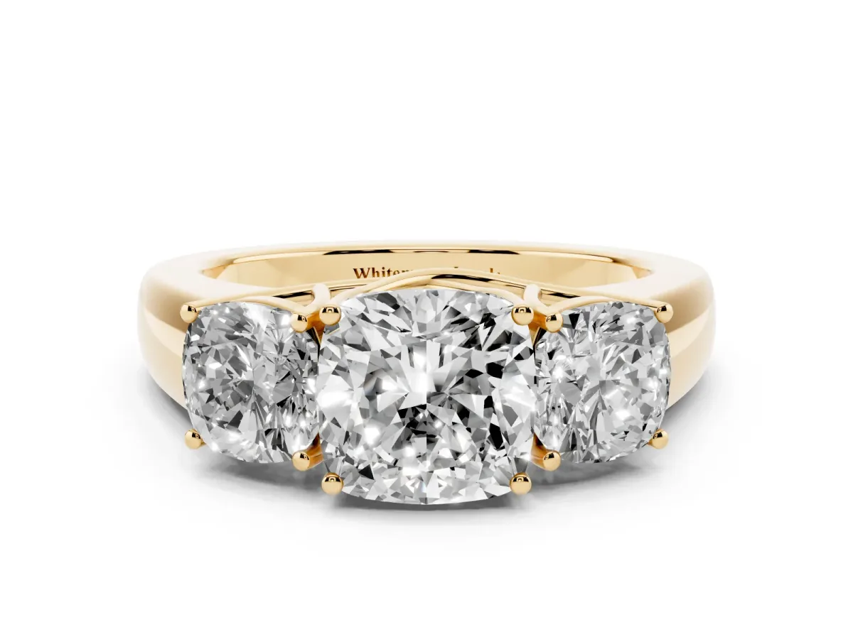 Three-Stone Cushion Cut Cut Diamond Ring with Prong Setting and Classic Band Yellow gold