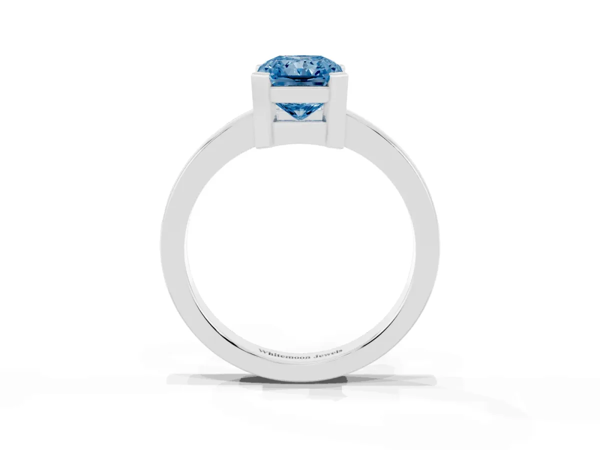Fancy Blue Radiant Cut Cut Solitaire Ring with Four-Prong Setting and Classic Band Silver