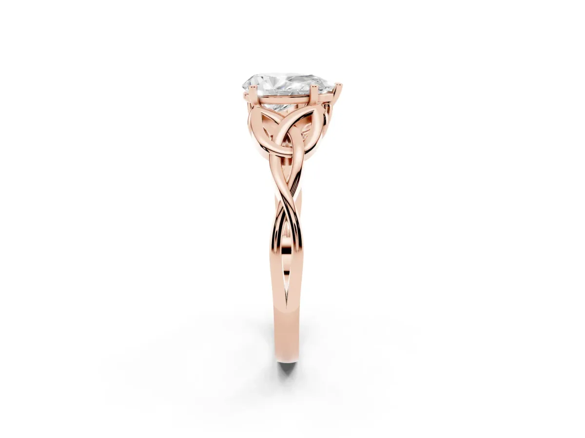Pear Cut Diamond Solitaire Engagement Ring with Celtic Knot Band and Four-Prong Setting Rose gold