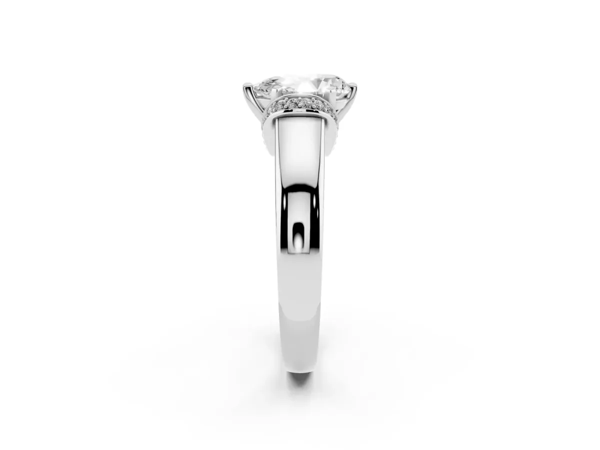 Pear Cut Solitaire Diamond Ring with Pave Band and Six-Prong Setting Silver