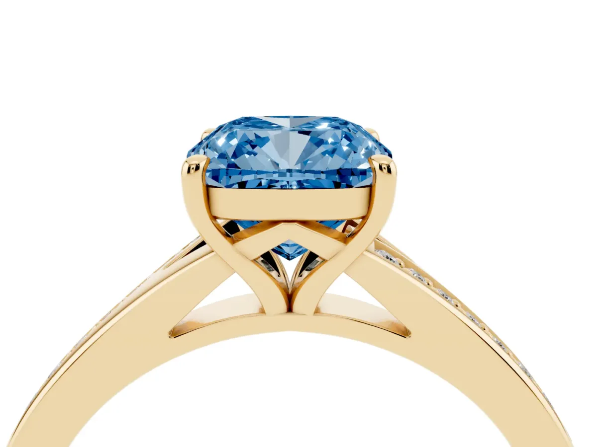 Fancy Blue Cushion Cut Diamond Solitaire Ring with Pavé Band and Prong Setting Yellow gold