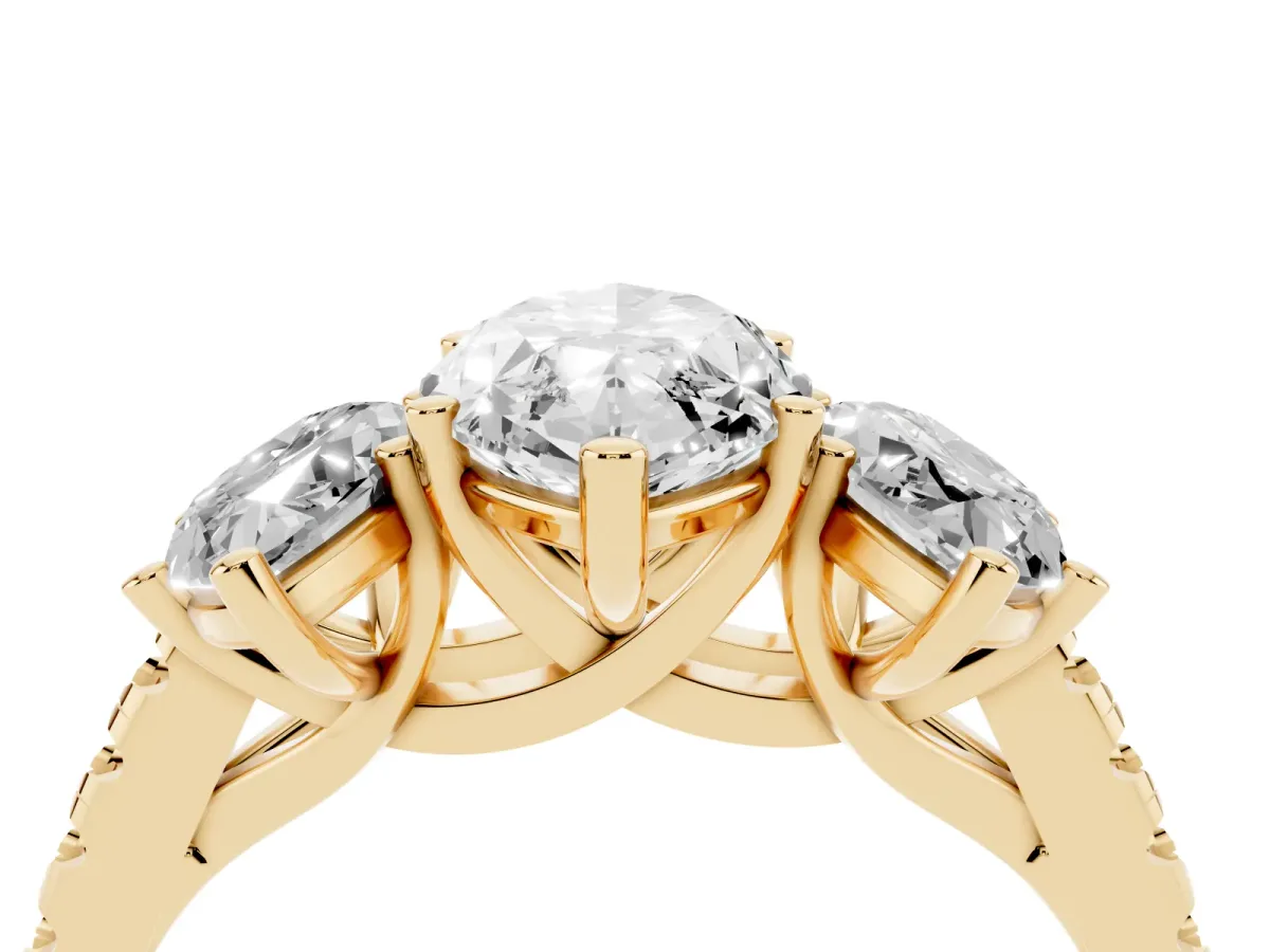 Three-Stone Marquise Cut Diamond Ring with Round Pavé Band and Prong Setting Yellow gold
