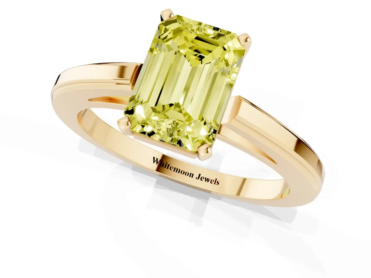 Fancy Yellow Emerald Cut Solitaire Diamond Ring with Four-Prong Setting and Classic Band Yellow gold