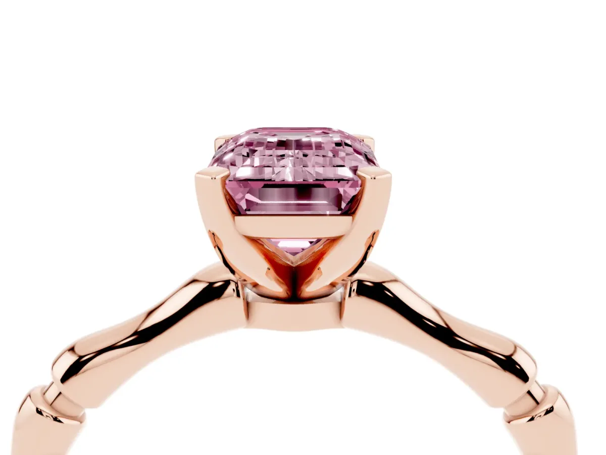 Fancy Pink Emerald Cut Solitaire Diamond Ring with Bamboo Band and Four-Prong Setting Rose gold