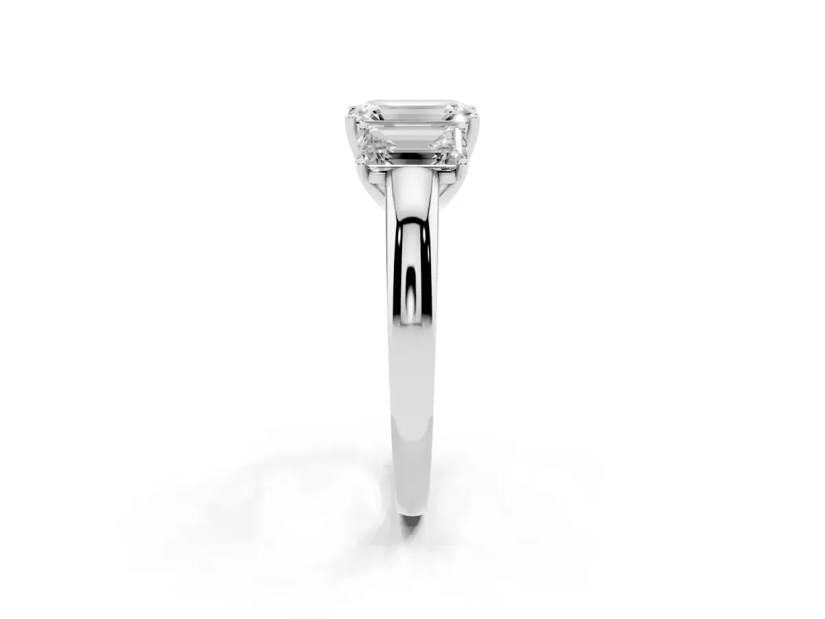 Emerald Cut Diamond Three-Stone Ring with Four-Prong Setting and Classic Band Platinum