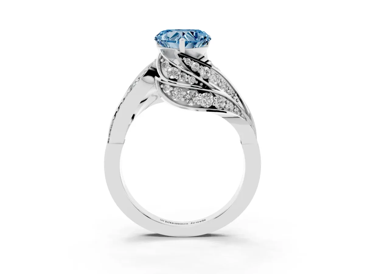 Fancy Blue Heart Cut Diamond Solitaire Ring with Prong Setting and Twisted Pavé Band Silver