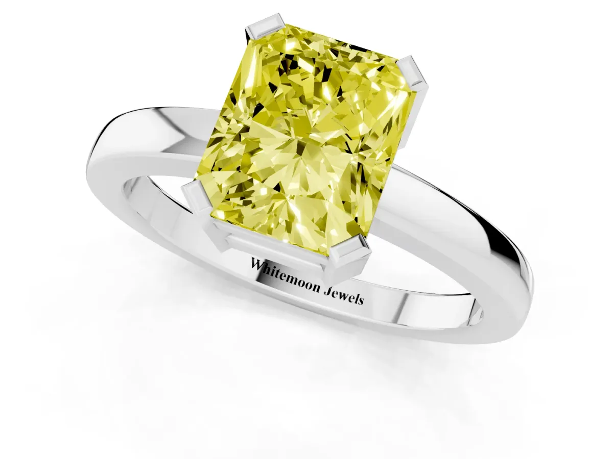 Fancy Yellow Radiant Cut Cut Solitaire Ring with Four-Prong Setting and Classic Band Silver