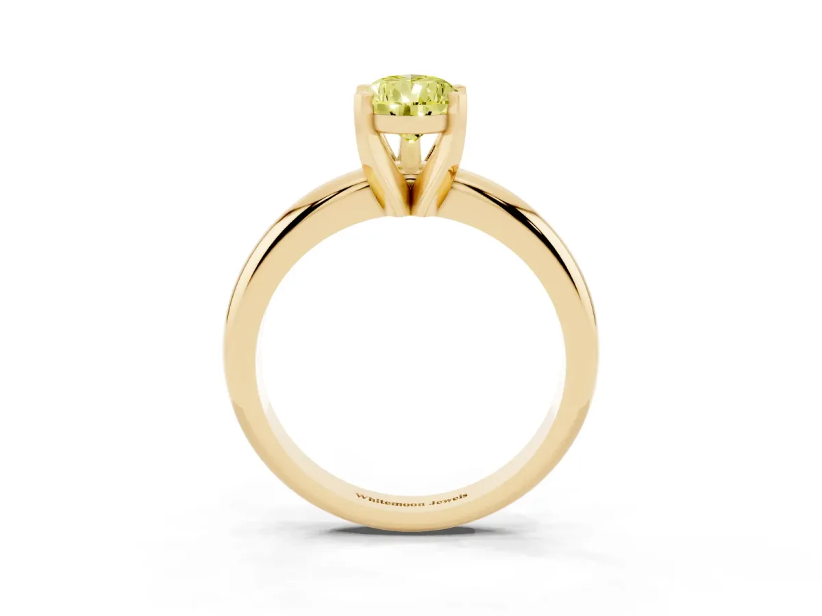 Fancy Yellow Pear Cut Diamond Solitaire Engagement Ring with Round Band and Four-Prong Setting Yellow gold