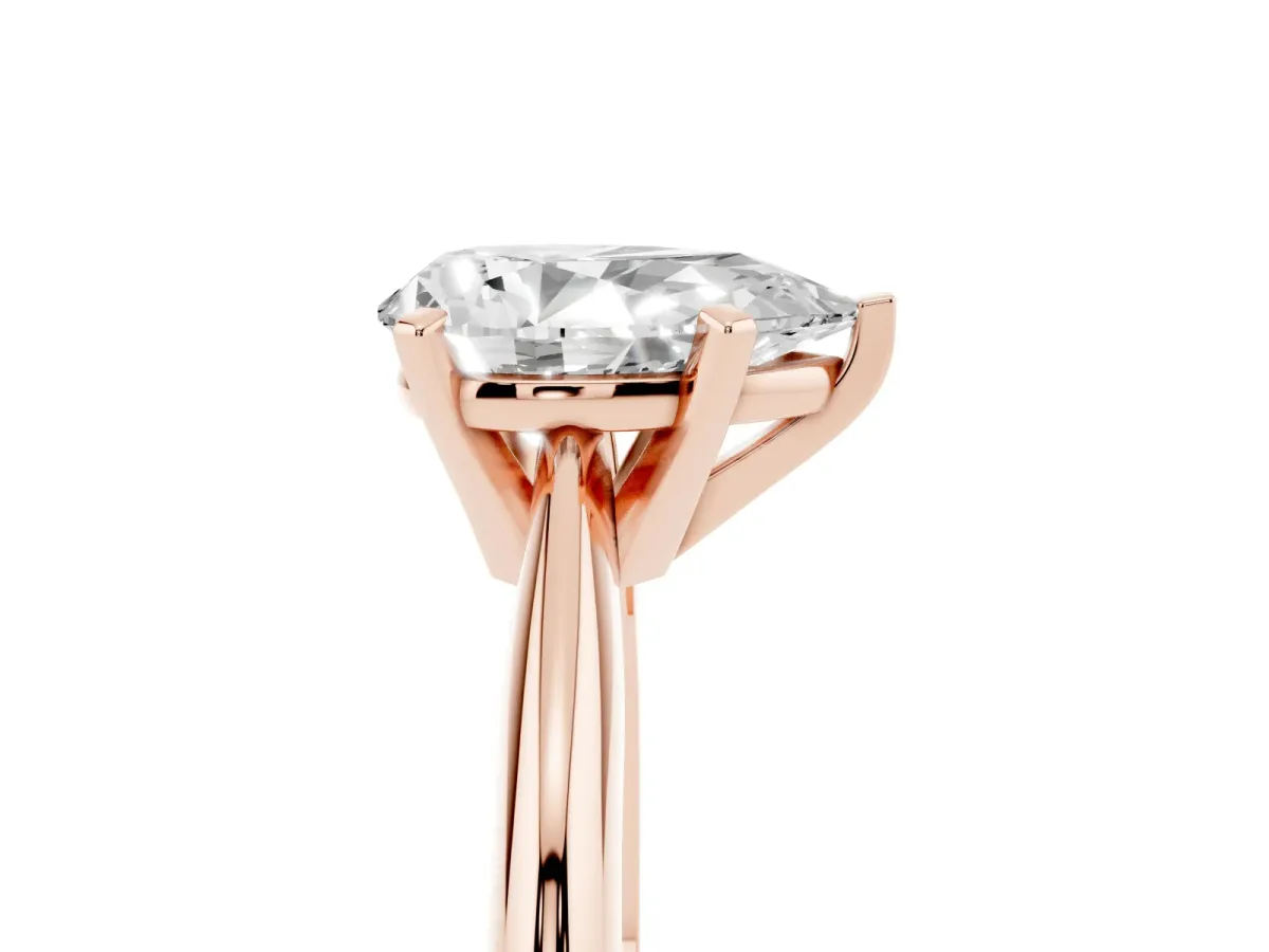 Pear Cut Cut Solitaire Ring with Four-Prong Setting on a Classic Band Rose gold
