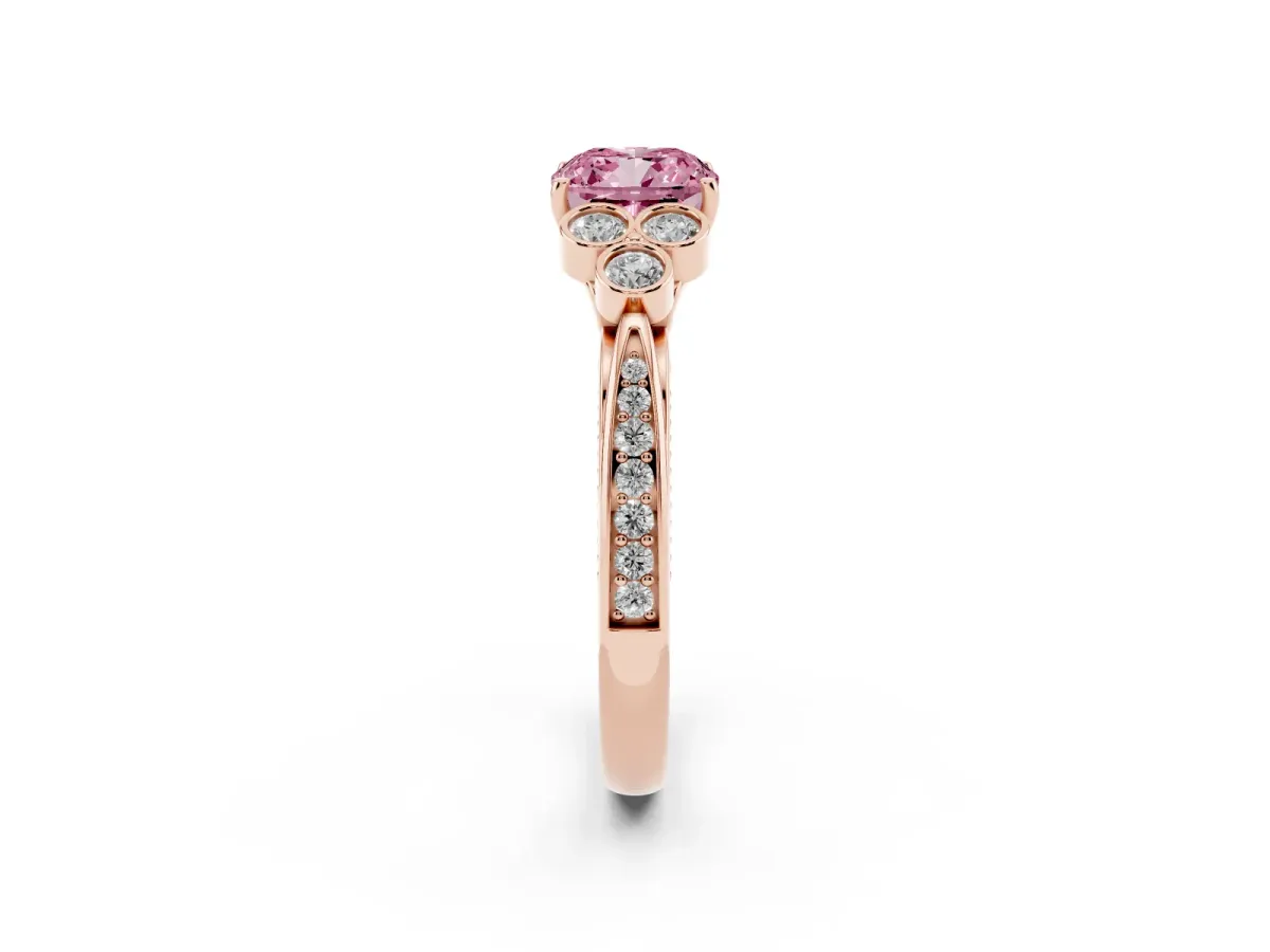 Fancy Pink Cushion Cut Cut Diamond Engagement Ring with Bezel Set Round Side Stones and Prong Setting Rose gold